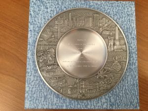Memory plate made of stone and metal