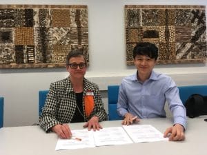 Seija Katajisto and Tung Hai are signing memorandum of understanding