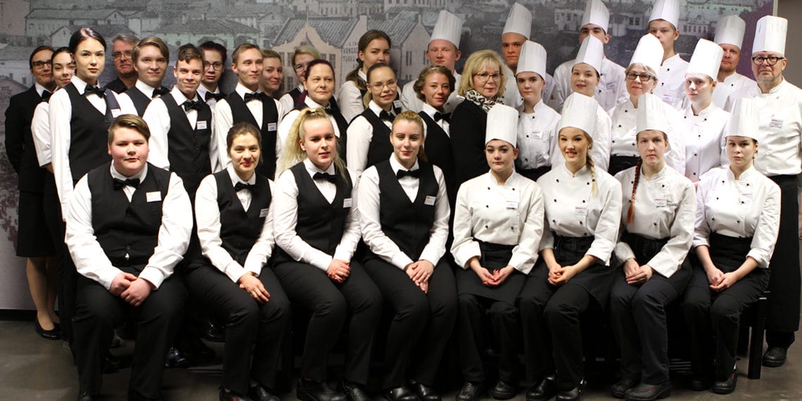 Group of cooks and waiters